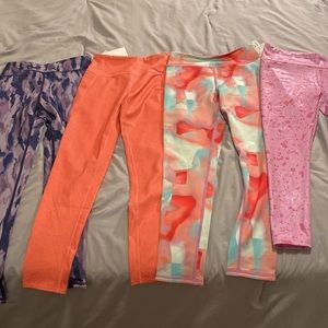 4 brand new pairs of girls leggings size M 8/10
